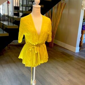 Anthropology neon yellow belted sweater.